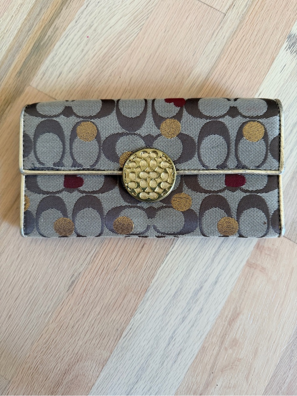 Coach Patterned Canvas Continental Wallet in Brown, Gold & Red